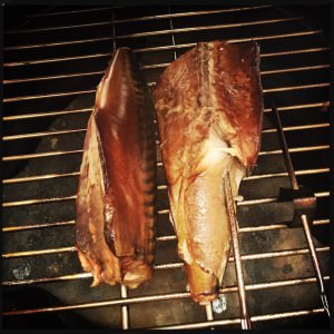 Smoked mackerel on the grill grate, almost done.