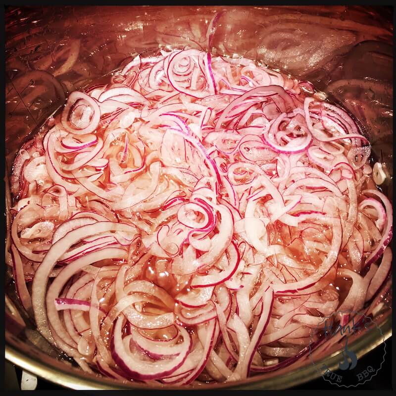 Pickled red onion in a pan