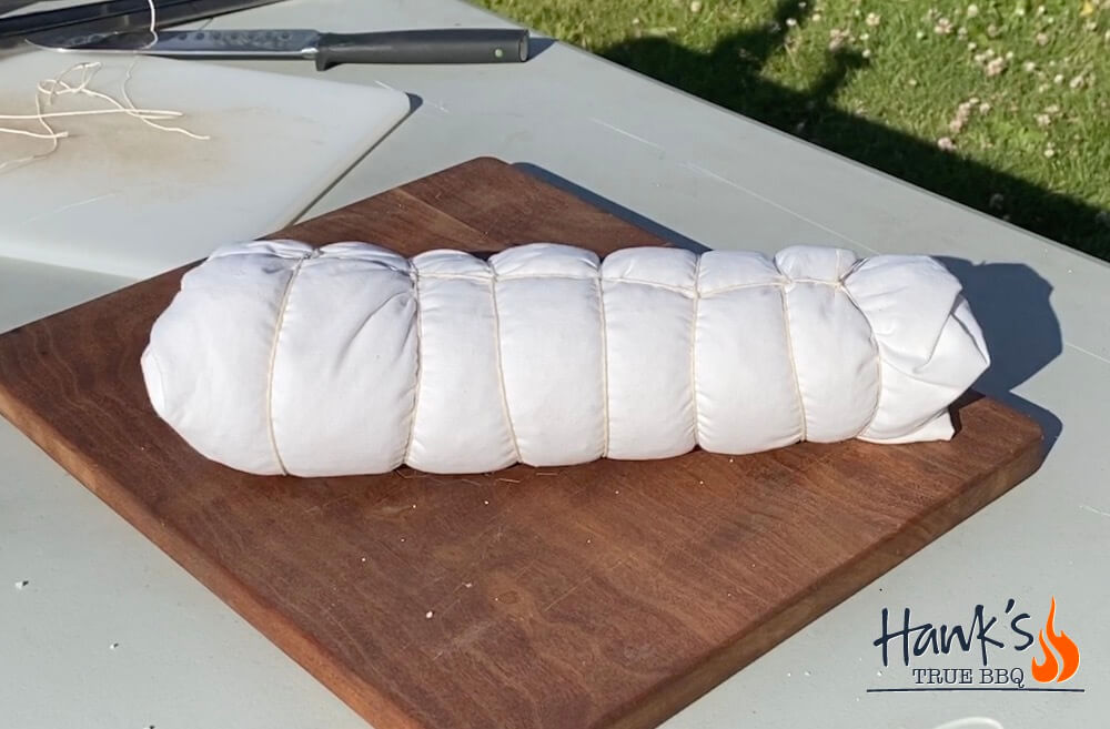 Pork loin wrapped in salt and a kitchen towel